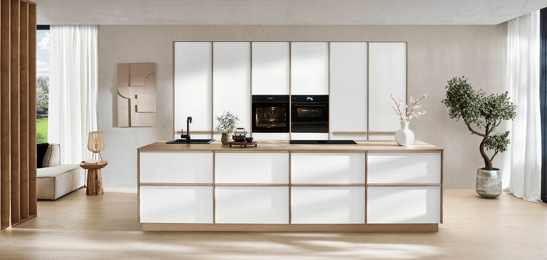 White German kitchen with slim integrated opening rails and oak accents