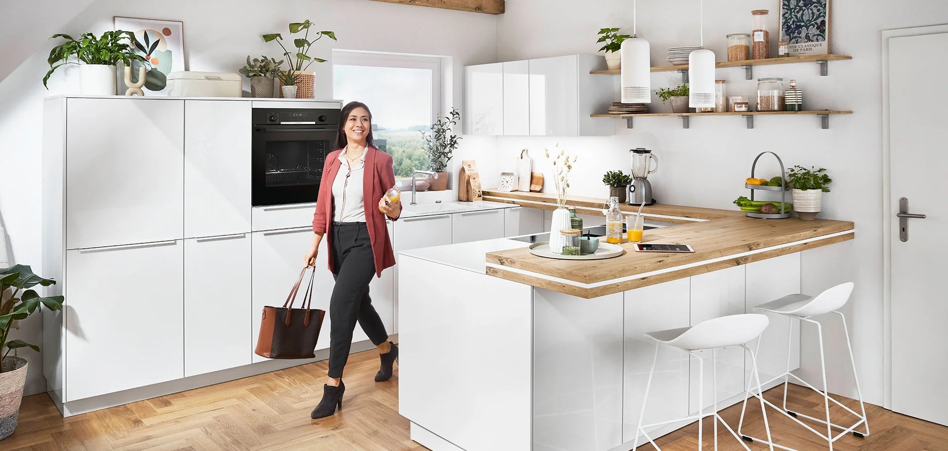 High-gloss white German kitchen with clean integrated opening lines