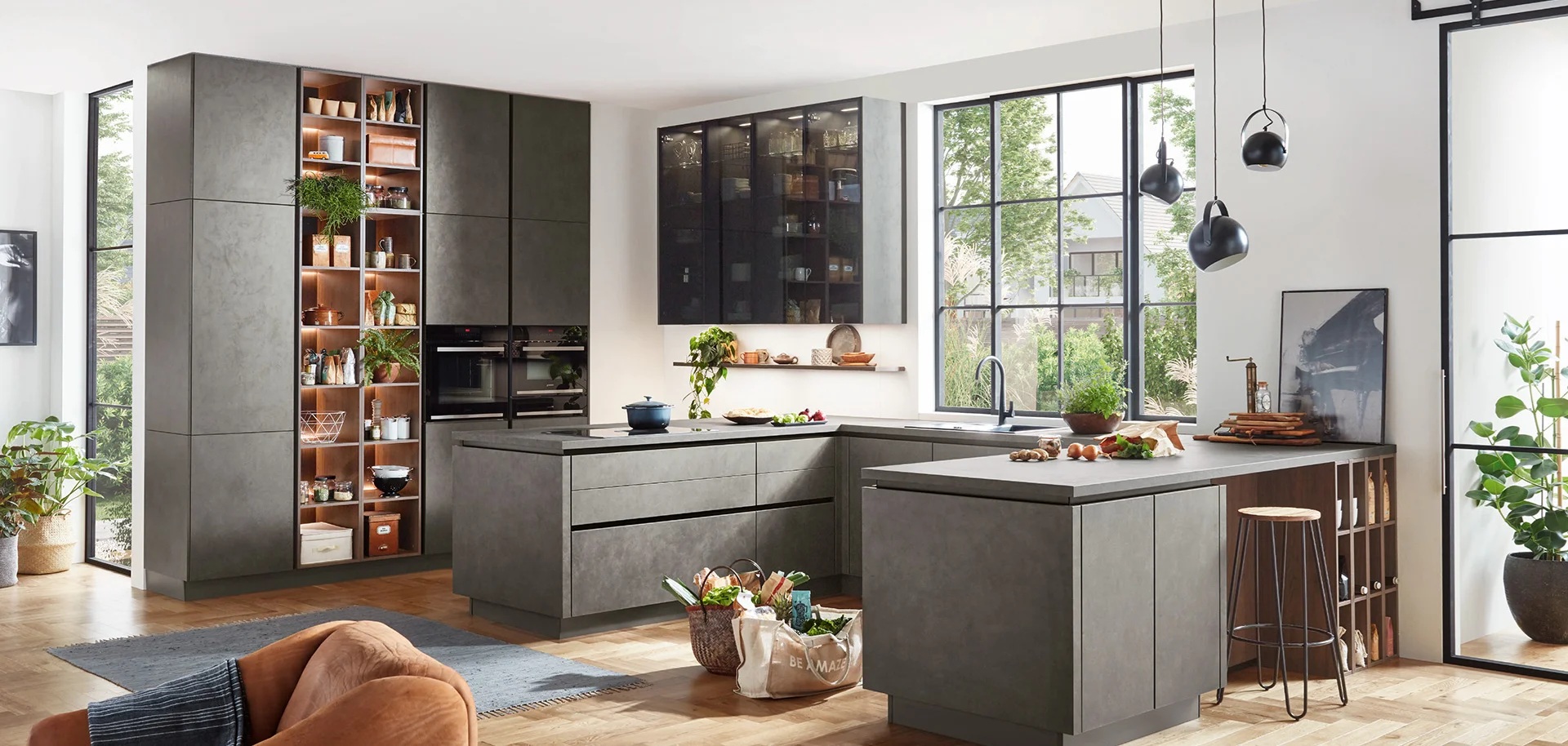 Modern German kitchen with concrete-effect cabinet fronts and island
